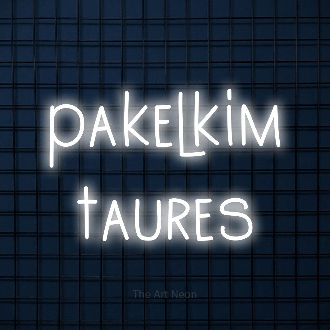 LED neon sign reading “pakelkim taures”, arranged in two lines.