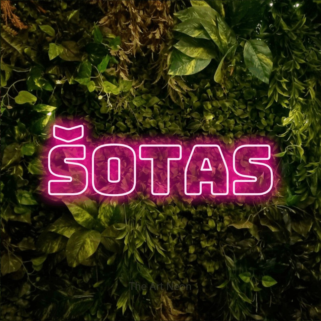 LED neon sign reading “ŠOTAS”, arranged in a single line.