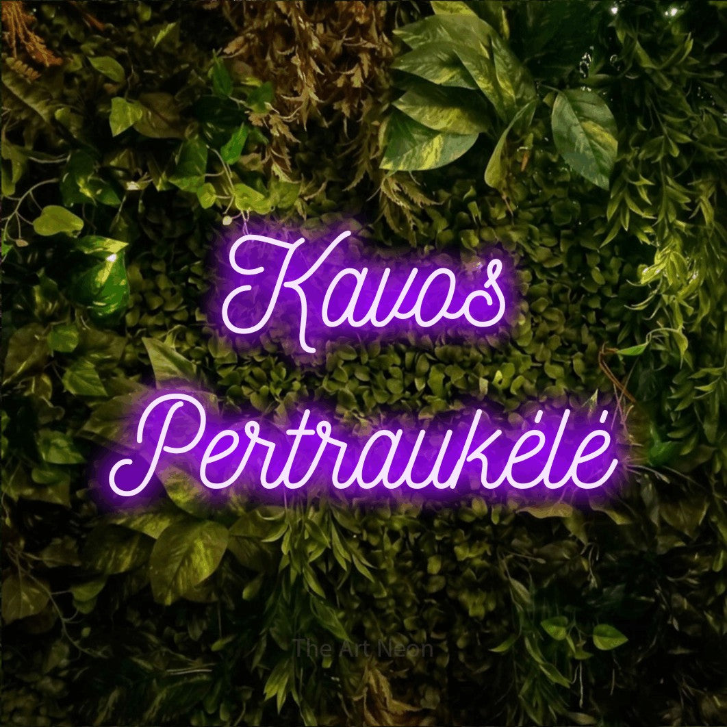 LED neon sign reading “Kavos Pertraukėlė”, arranged in two lines.