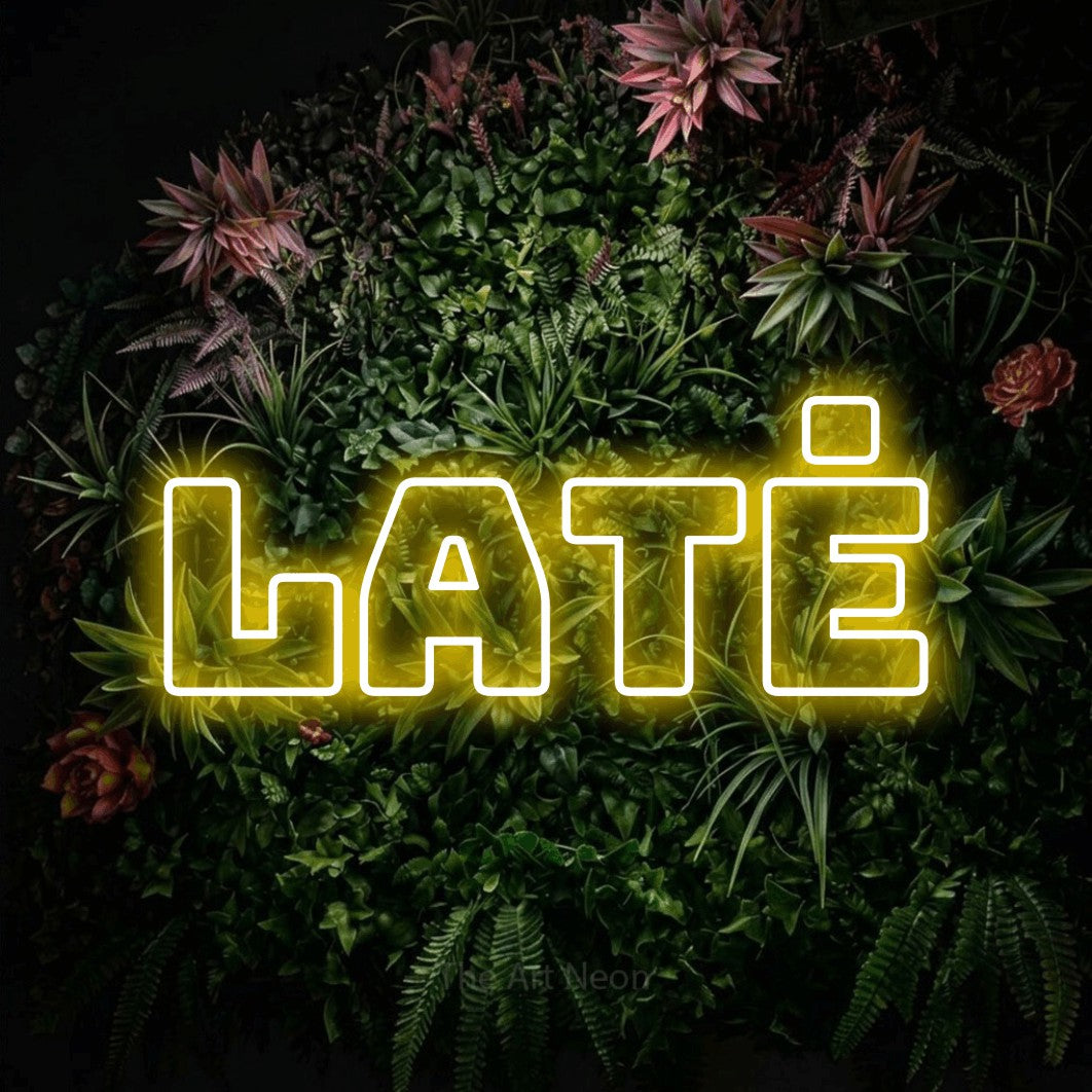 LED neon sign reading “latė”, arranged in a single line.