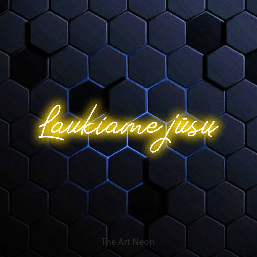 LED neon sign reading “Laukiame jūsų”, arranged in a single line.
