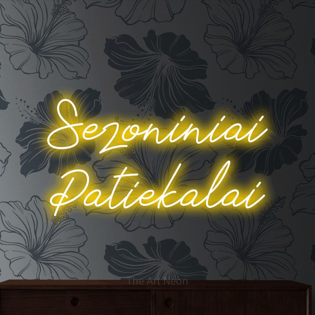 LED neon sign reading “Sezoniniai Patiekalai”, arranged in two lines.