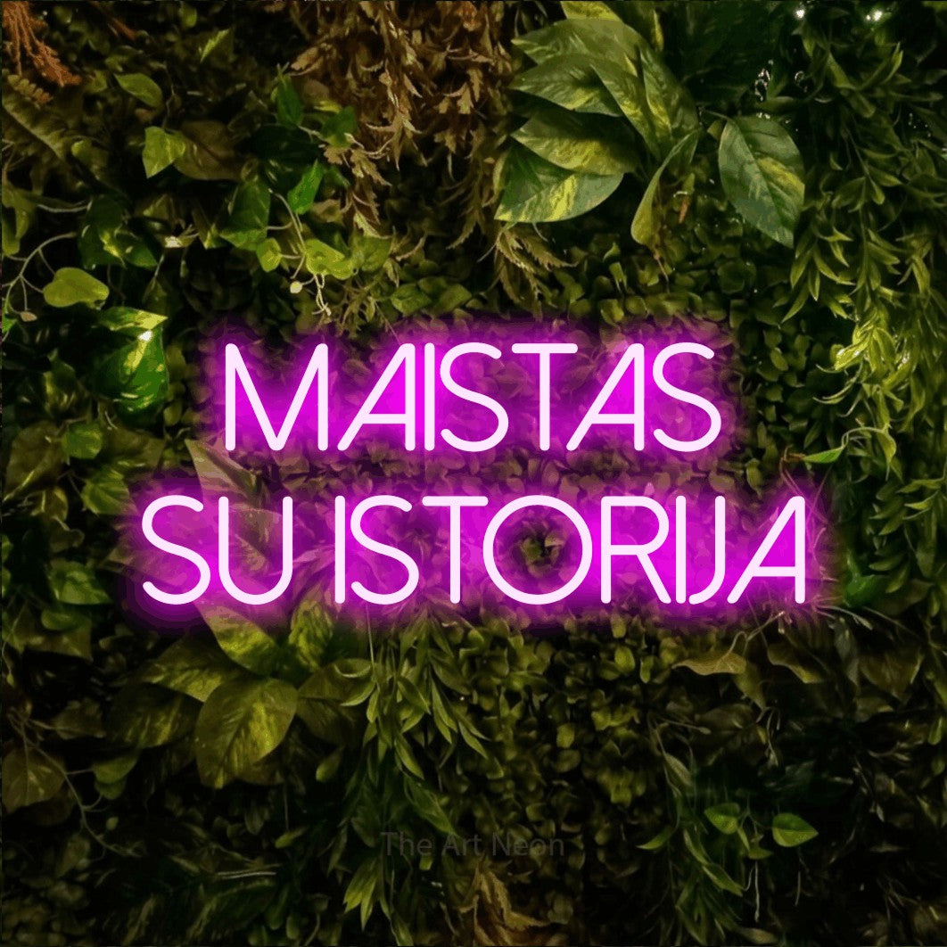 LED neon sign reading “MAISTAS SU ISTORIJA”, arranged in two lines.