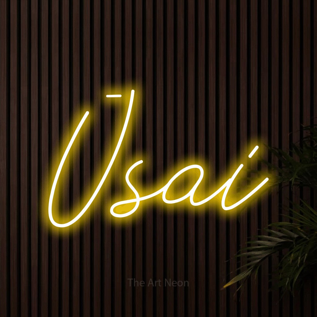 LED neon sign reading “Ūsai”, arranged in a single line.
