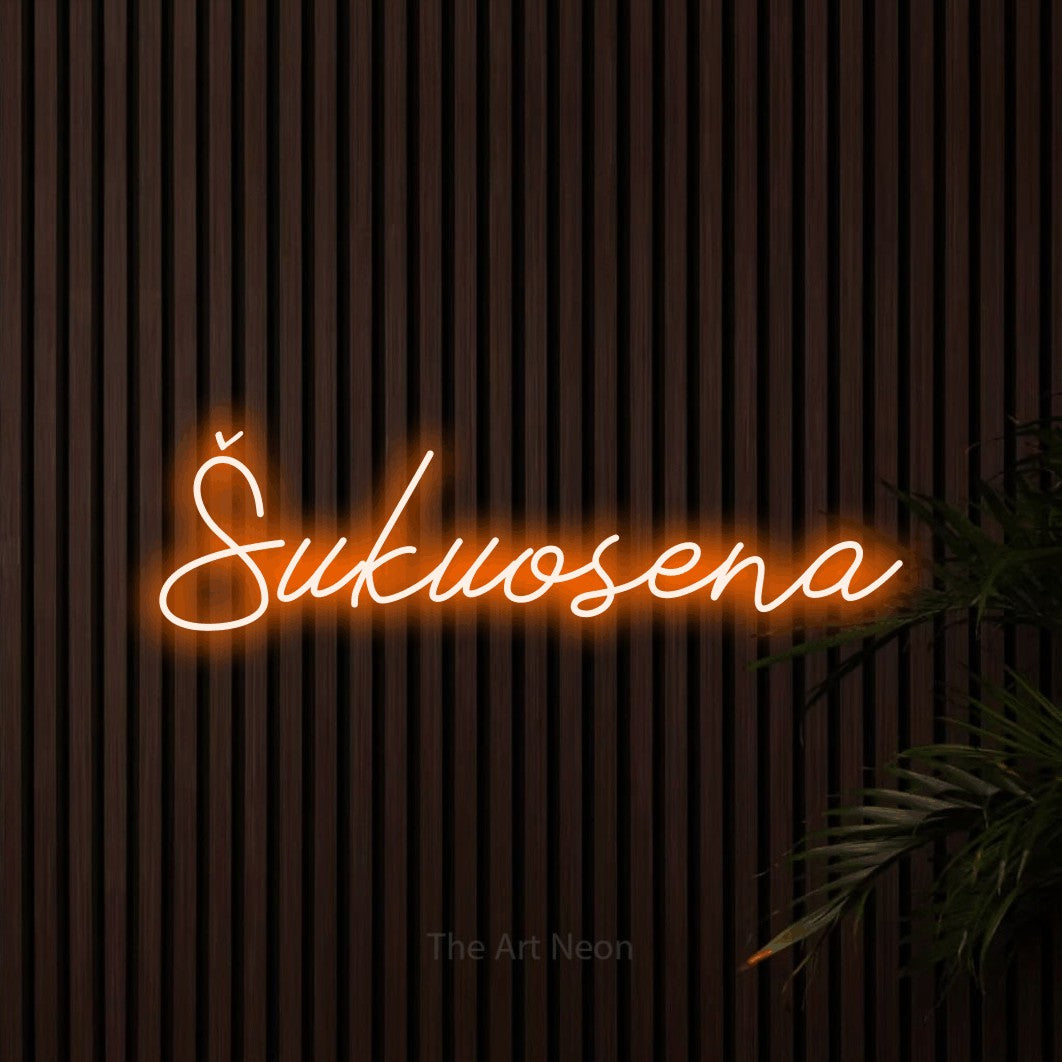 LED neon sign reading “Šukuosena”, arranged in a single line.