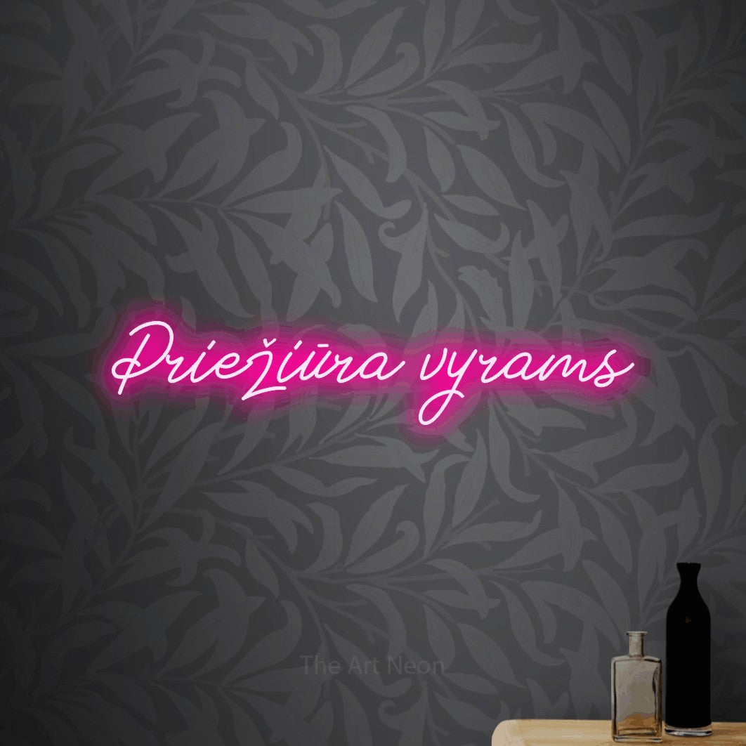 LED neon sign reading “Priežiūra vyrams”, arranged in a single line.