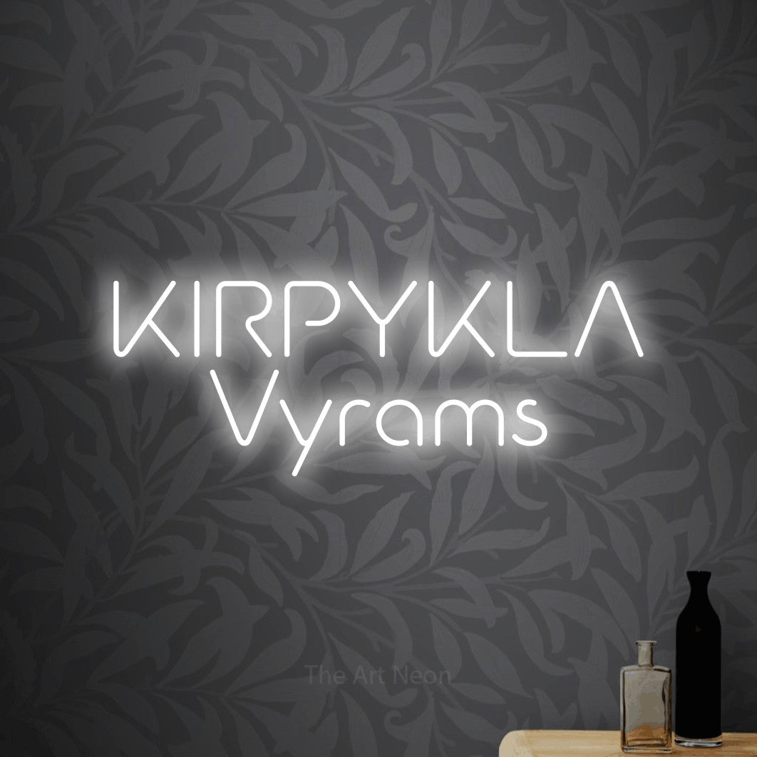 LED neon sign reading “KIRPYKLA Vyrams”, arranged in two lines.