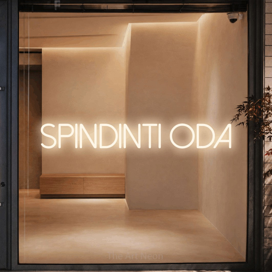 LED neon sign reading “spindinti oda”, arranged in a single line.