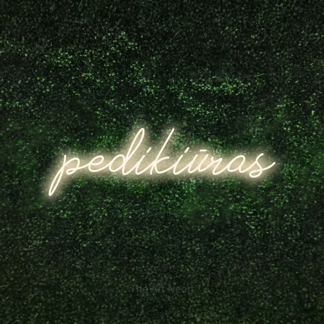 LED neon sign reading “pedikiūras”, arranged in a single line.