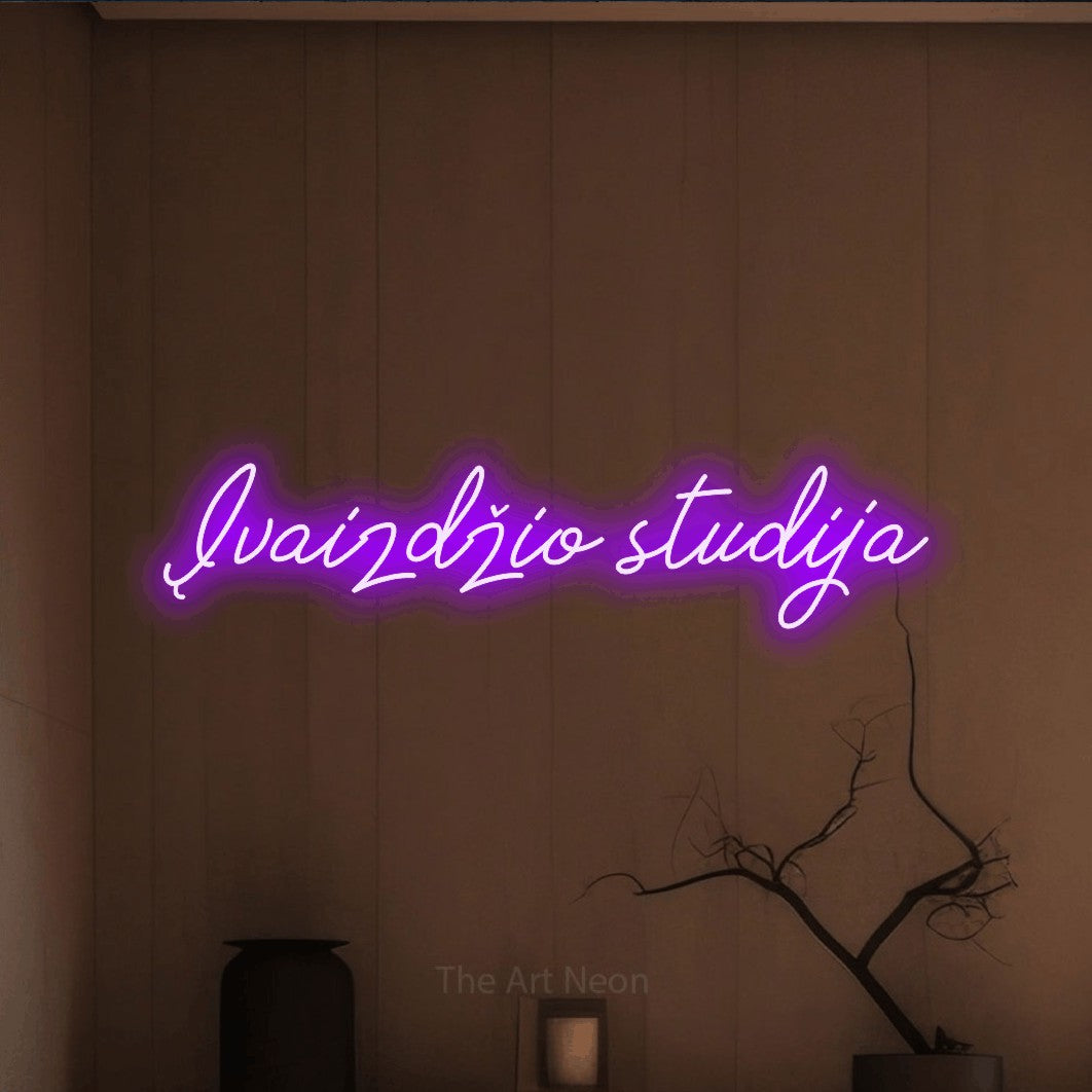 LED neon sign reading “Įvaizdžio studija”, arranged in a single line.