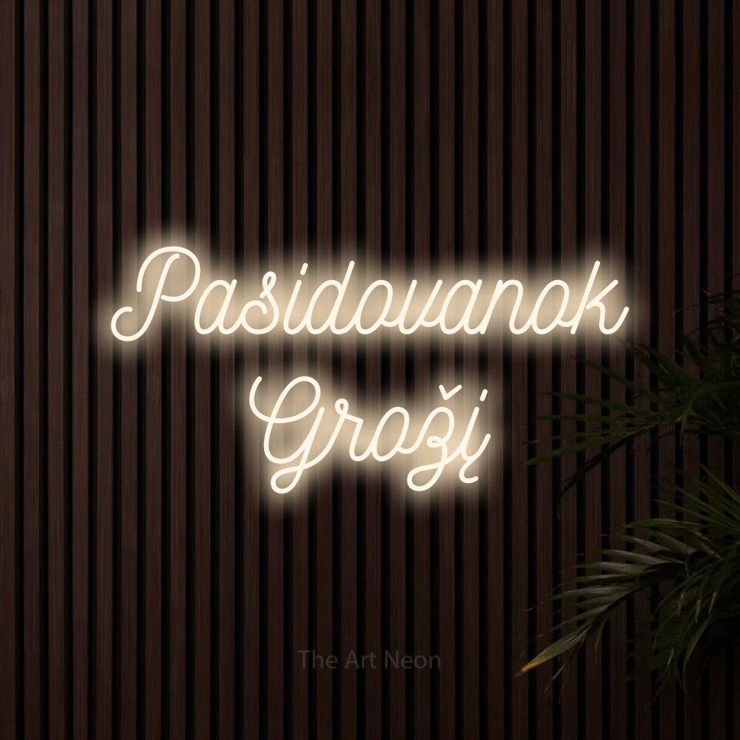LED neon sign reading “Pasidovanok Grožį”, arranged in two lines.