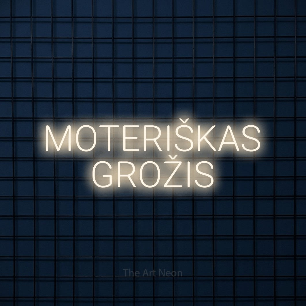 LED neon sign reading “MOTERIŠKAS GROŽIS”, arranged in two lines.