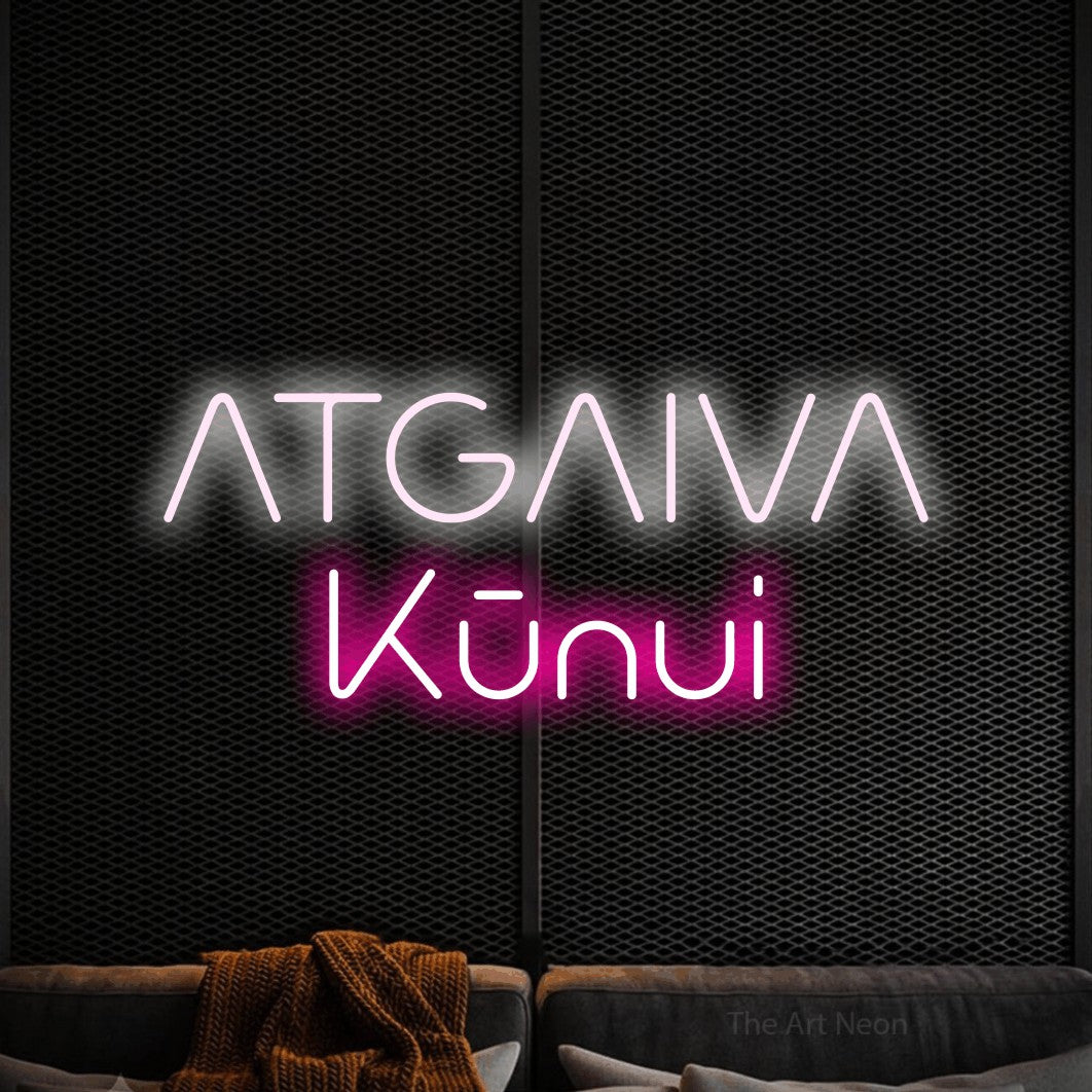 LED neon sign reading “ATGAIVA Kūnui”, arranged in two lines.