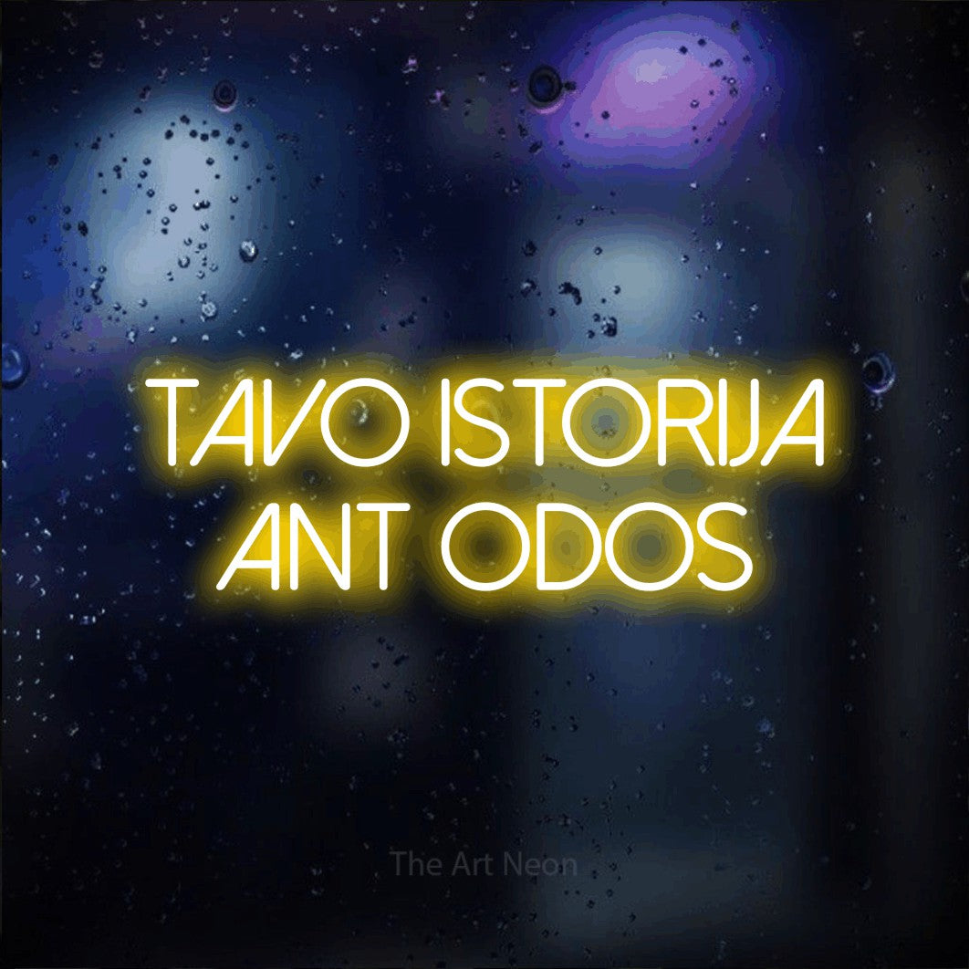 LED neon sign reading “Tavo Istorija Ant Odos”, arranged in two lines.