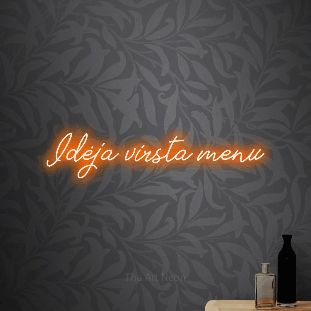 LED neon sign reading “Idėja virsta menu”, arranged in a single line.