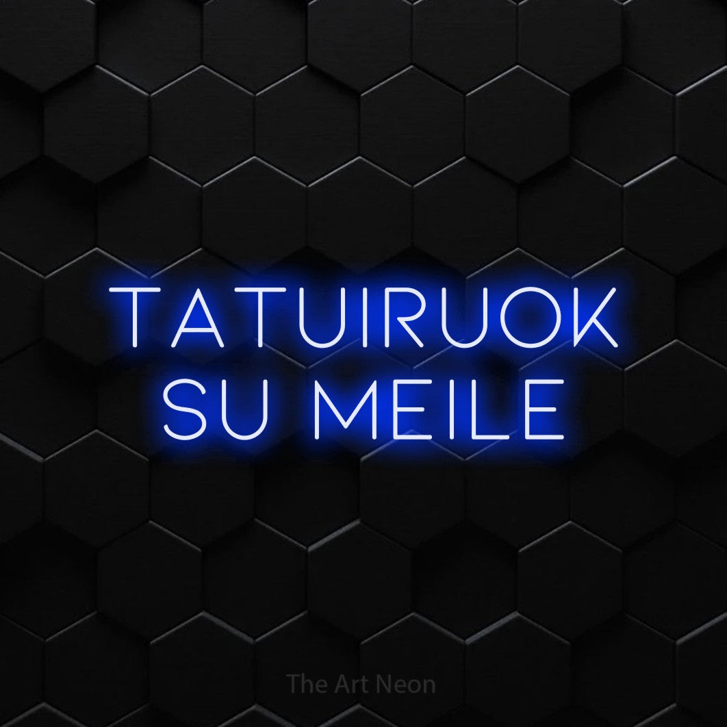 LED neon sign reading “Tatuiruok Su Meile”, arranged in two lines.