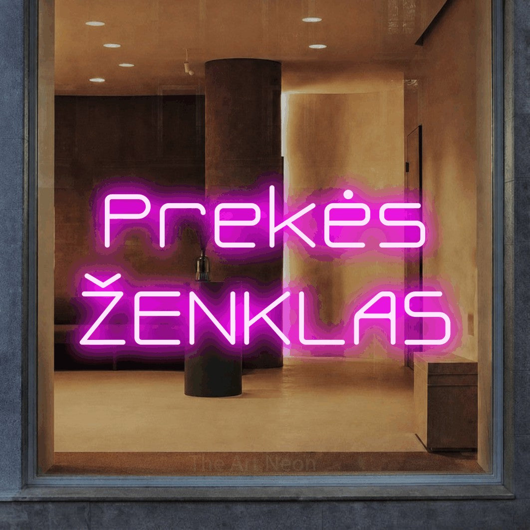 LED neon sign reading “Prekės ŽENKLAS”, arranged in two lines.