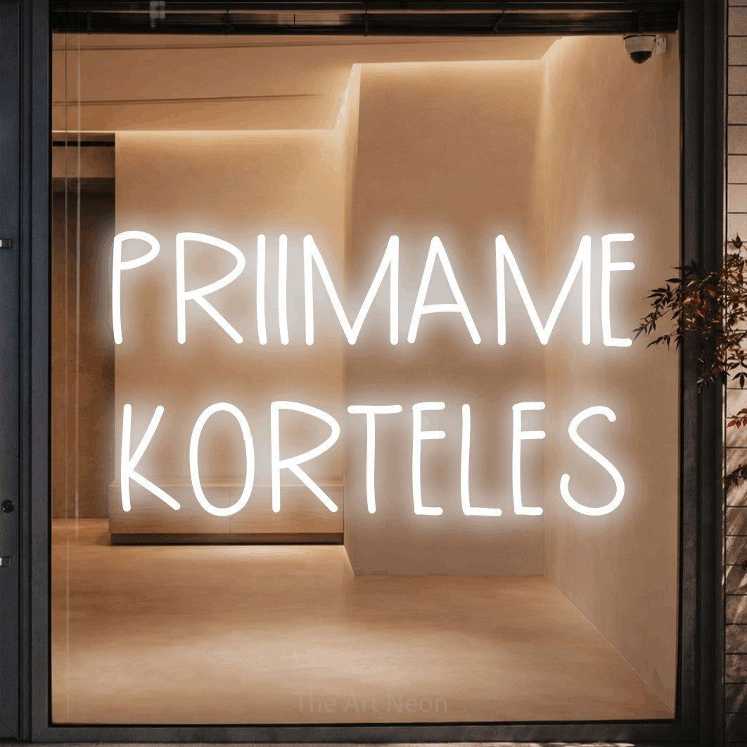 LED neon sign reading “PRIIMAME KORTELES”, arranged in two lines.