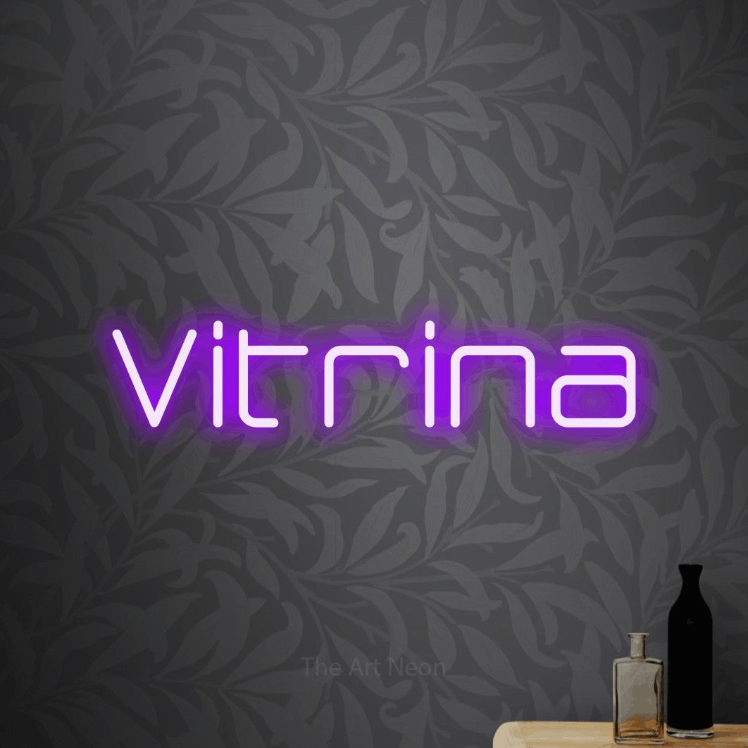 LED neon sign reading “Vitrina”, arranged in a single line.