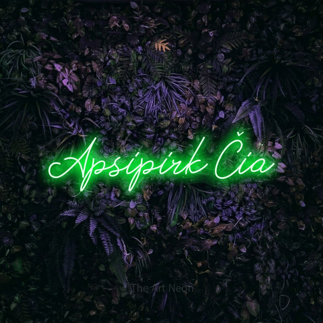 LED neon sign reading “Apsipirk Čia”, arranged in a single line.