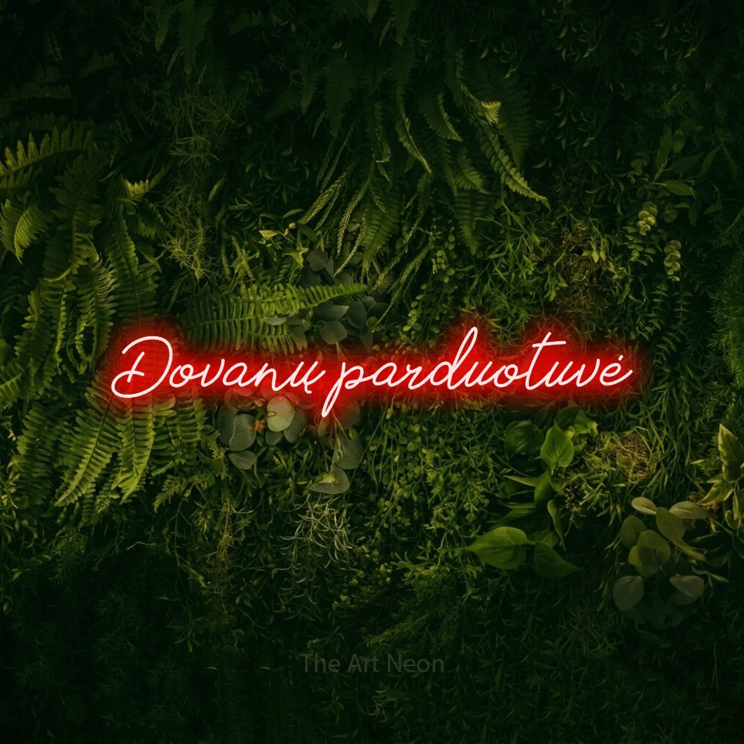 LED neon sign reading “Dovanų parduotuvė”, arranged in a single line.