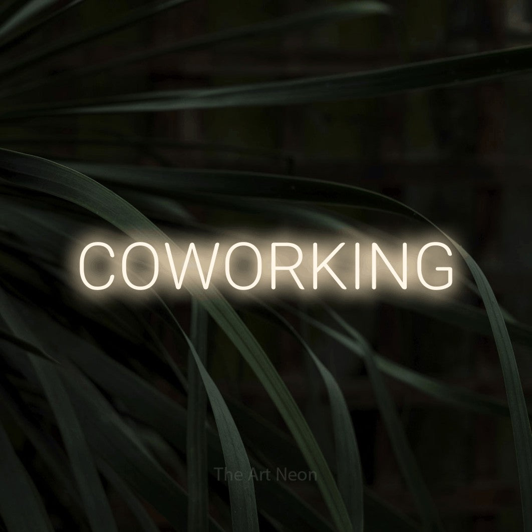 LED neon sign reading “COWORKING”, arranged in a single line.