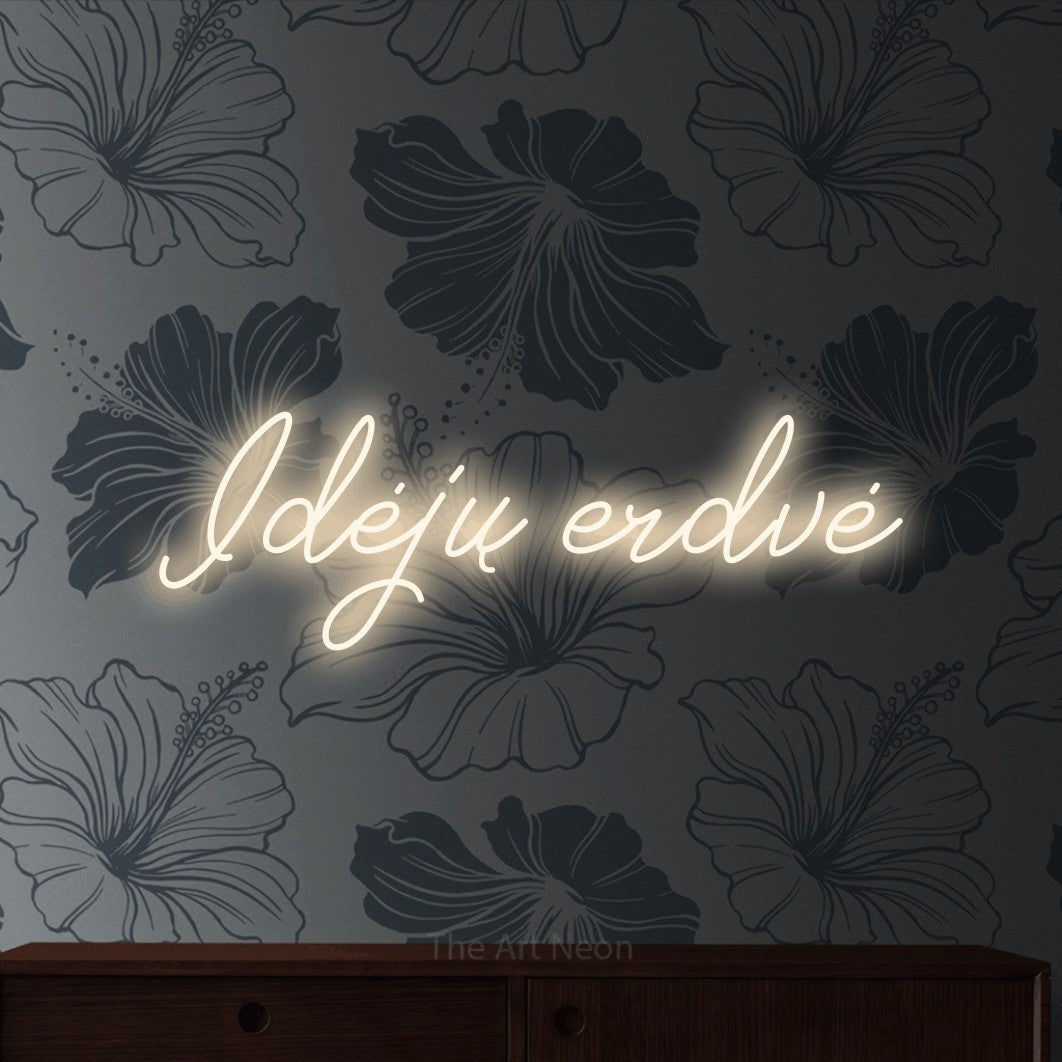 LED neon sign reading “Idėjų erdvė”, arranged in a single line.