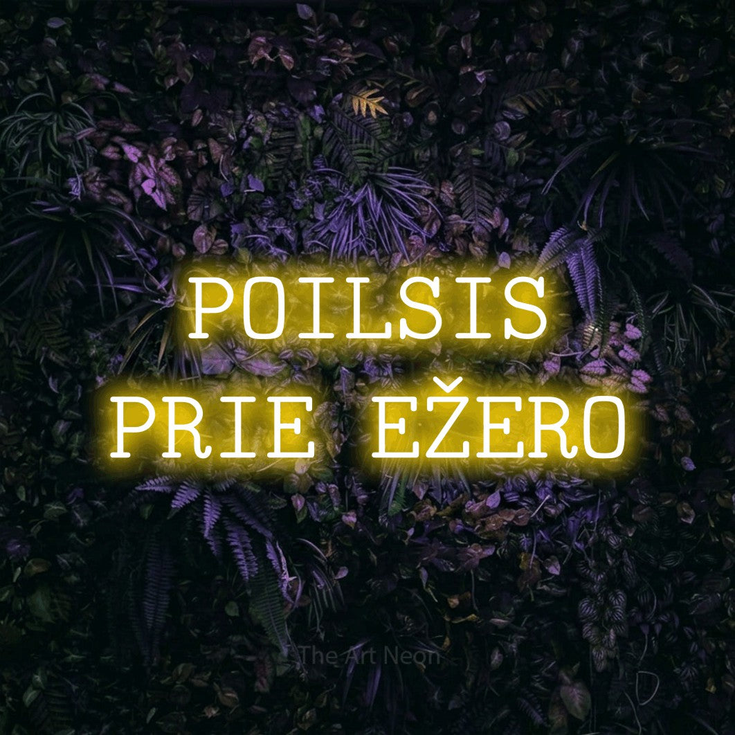 LED neon sign reading “POILSIS PRIE EŽERO”, arranged in two lines.
