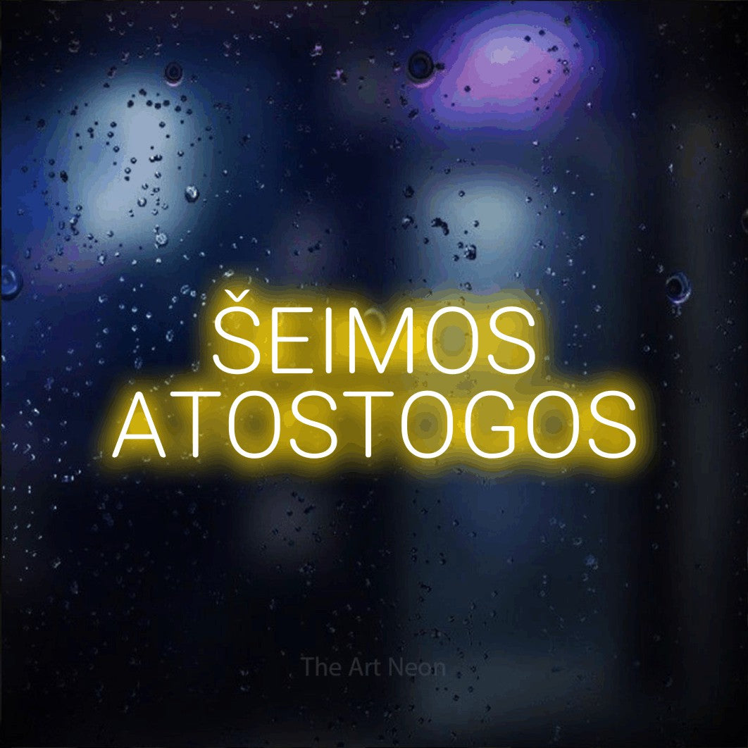 LED neon sign reading “ŠEIMOS ATOSTOGOS”, arranged in two lines.