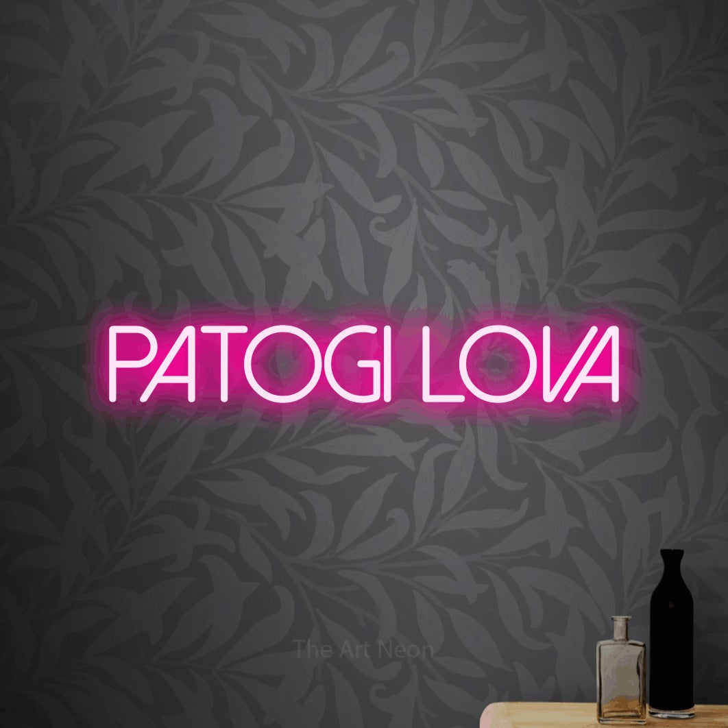 LED neon sign reading “PATOGI LOVA”, arranged in a single line.