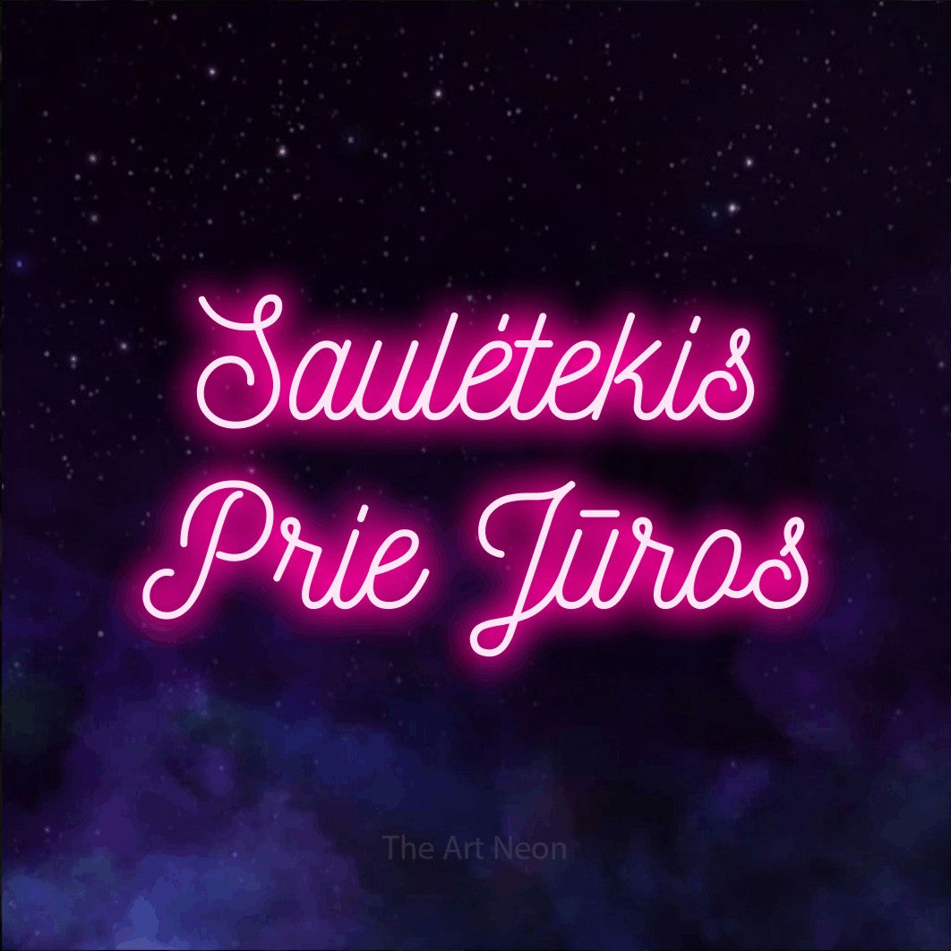 LED neon sign reading “Saulėtekis Prie Jūros”, arranged in two lines.