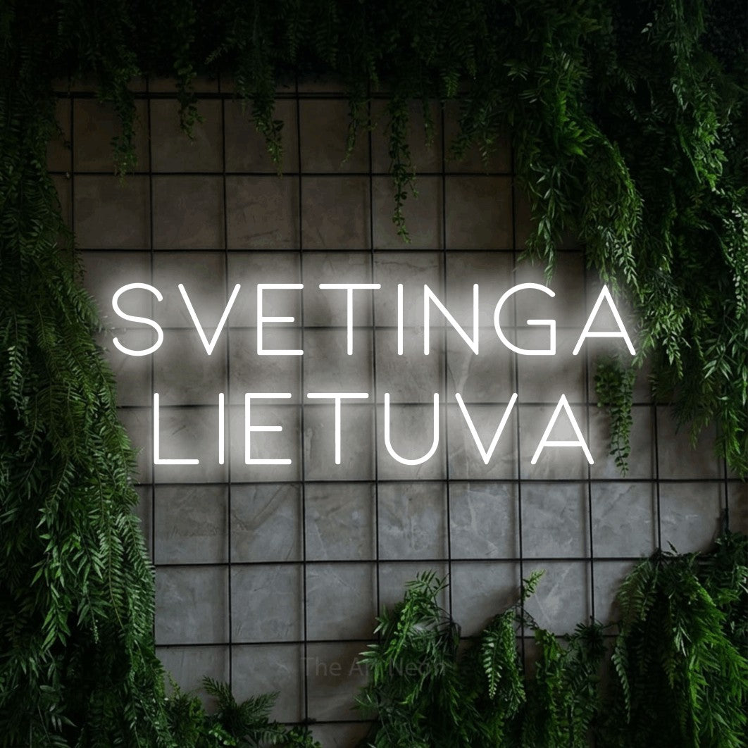 LED neon sign reading “Svetinga Lietuva”, arranged in two lines.