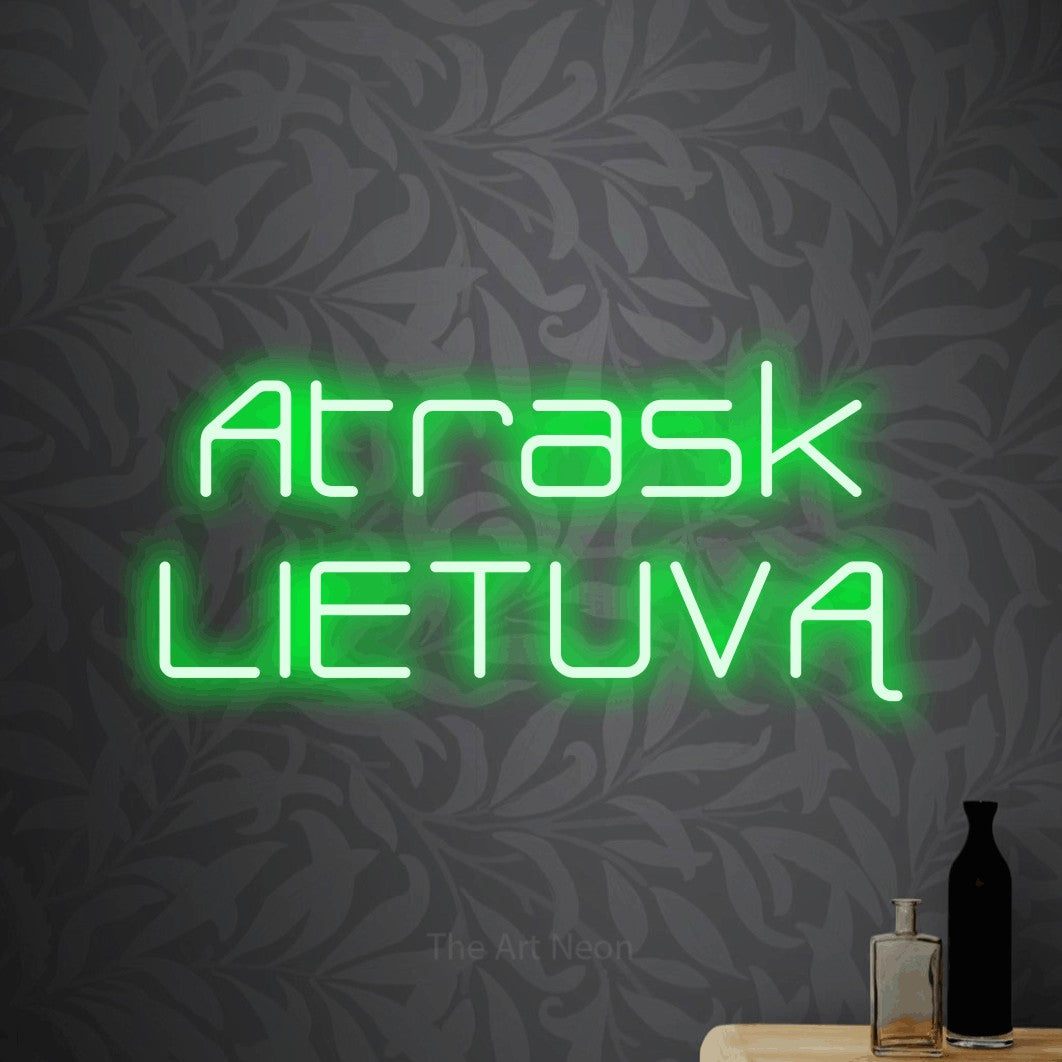 LED neon sign reading “Atrask LIETUVĄ”, arranged in two lines.