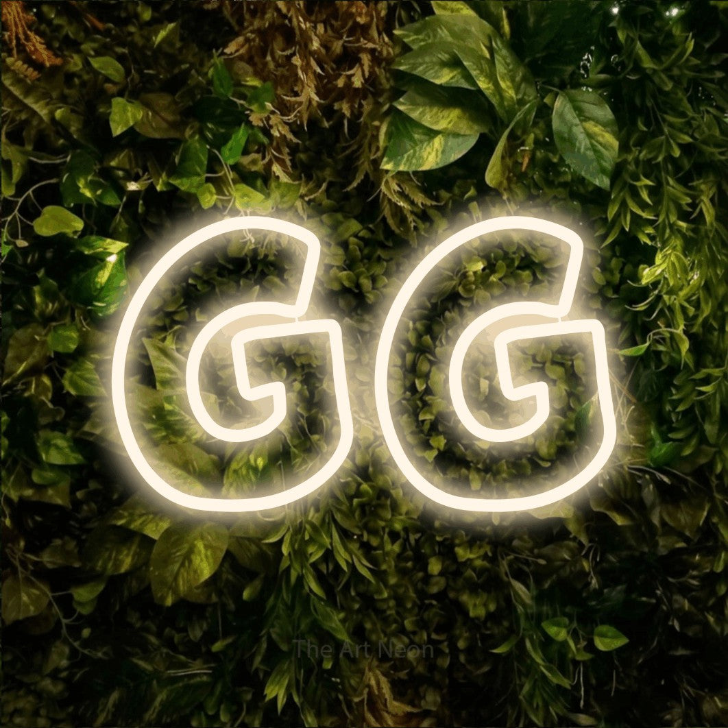 LED neon sign reading “GG”, arranged in a single line.