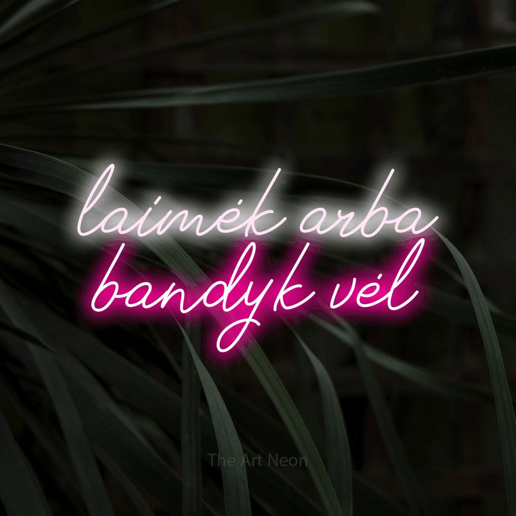 LED neon sign reading “laimėk arba bandyk vėl”, arranged in two lines.