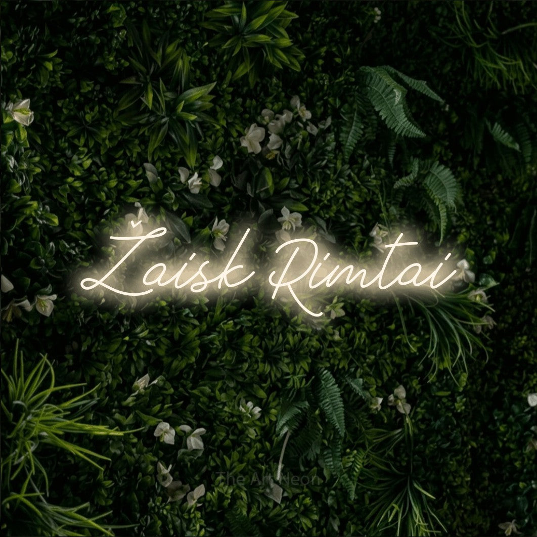 LED neon sign reading “Žaisk Rimtai”, arranged in a single line.