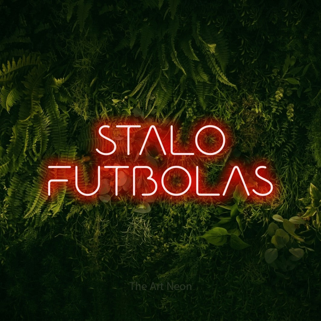 LED neon sign reading “STALO FUTBOLAS”, arranged in two lines.