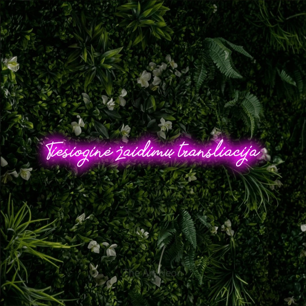 LED neon sign reading “Tiesioginė žaidimų transliacija”, arranged in a single line.