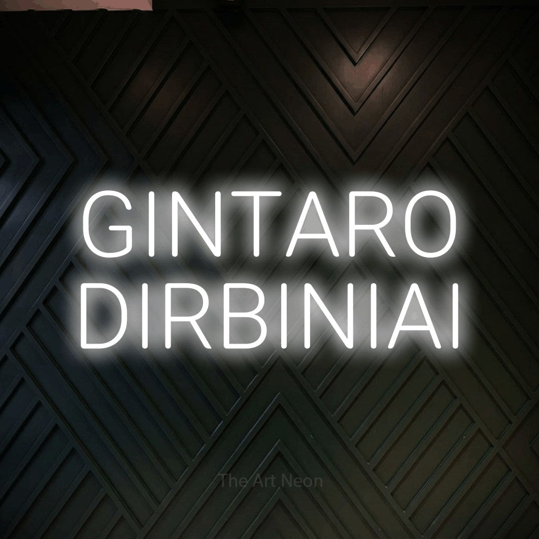 LED neon sign reading “GINTARO DIRBINIAI”, arranged in two lines.