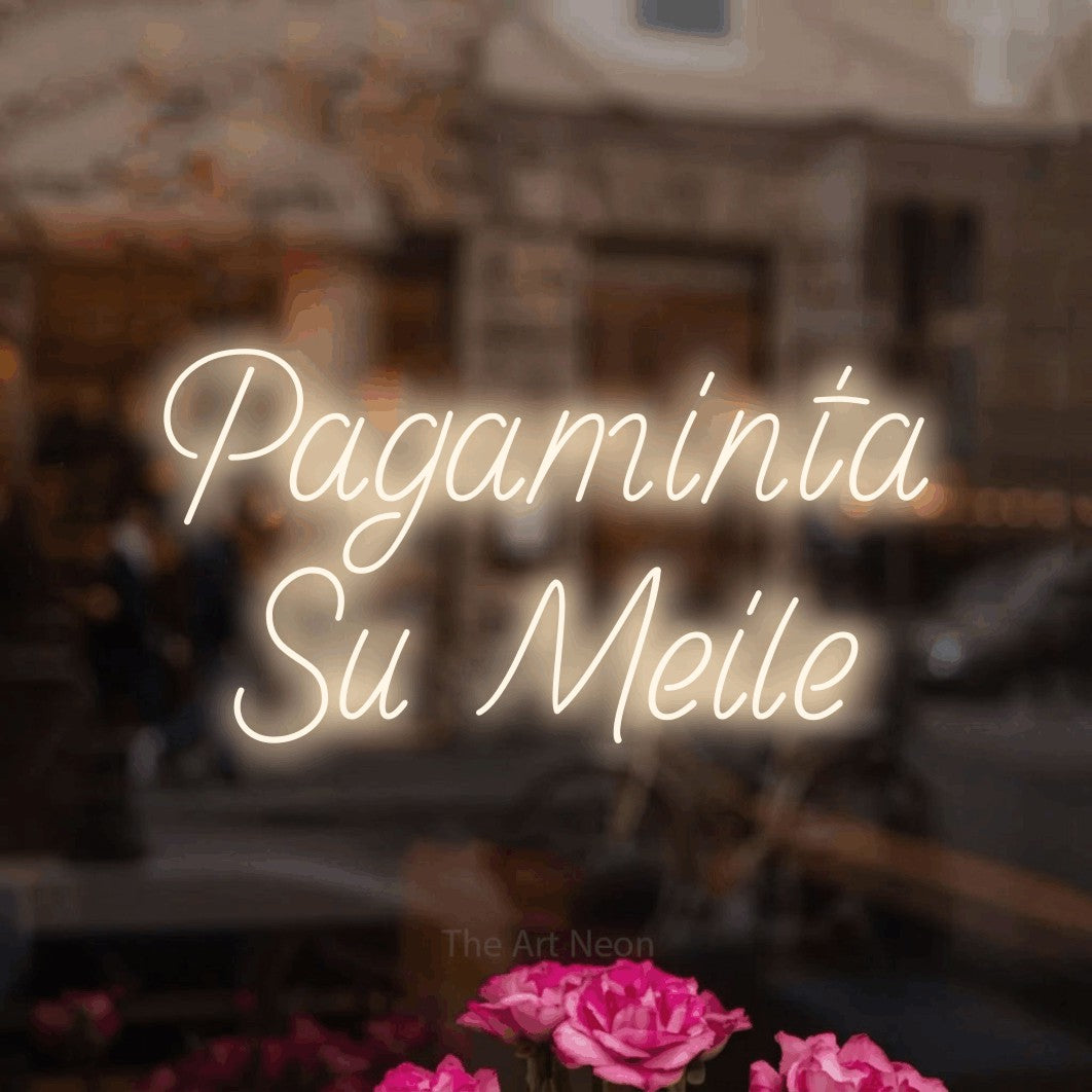 LED neon sign reading “Pagaminta Su Meile”, arranged in two lines.