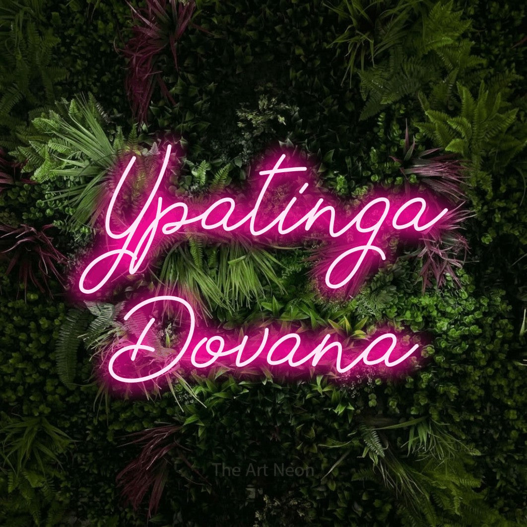 LED neon sign reading “Ypatinga Dovana”, arranged in two lines.