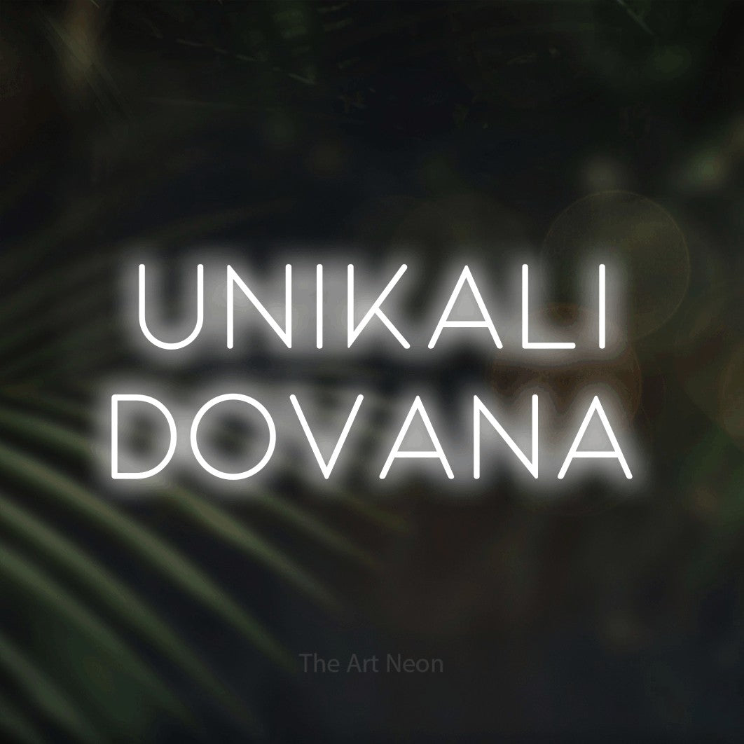 LED neon sign reading “UNIKALI DOVANA”, arranged in two lines.