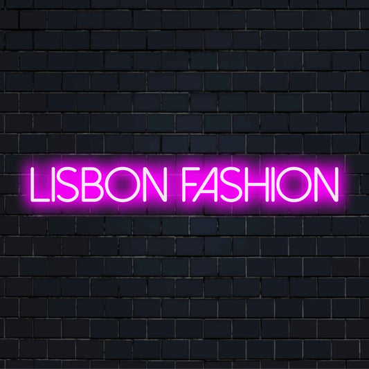 Lisbon Fashion Neon Sign, glowing neon text on dark brick background