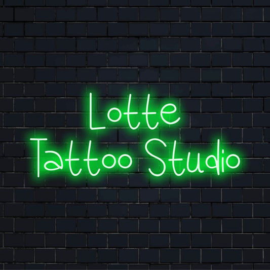 Lotte Tattoo Studio Personalized Neon Light with neon text light on dark brick wall
