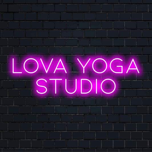 Lova Yoga Studio Personalized LED Neon Sign, glowing lettering on black brick background