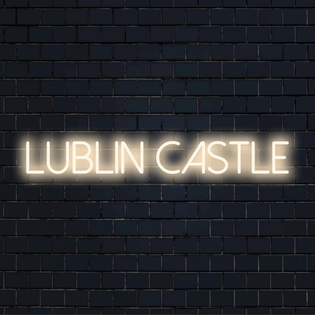 Lublin Castle Neon Light with glowing lettering on black brick background