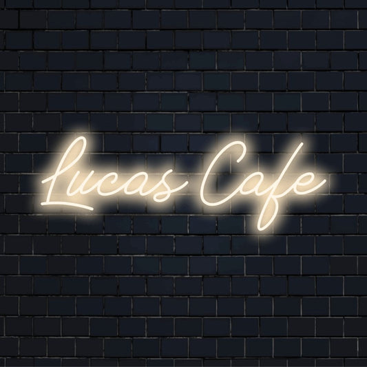 Lucas Cafe Custom Name Neon Sign, bright LED glow on dark brick background