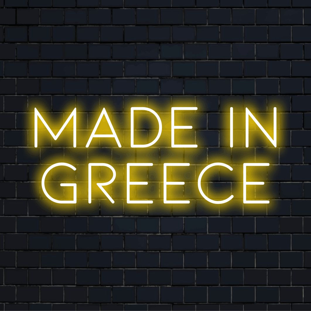 Made In Greece Neon Sign, glowing wall decor on dark brick background