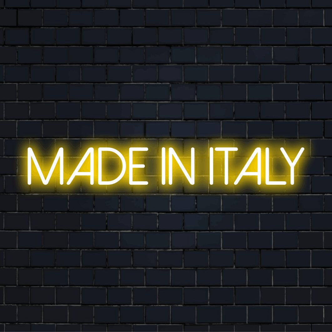Made In Italy Neon Sign, bright neon glow against brick backdrop