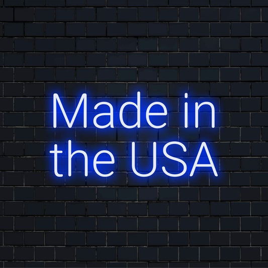 Made In The Usa Neon Light with glowing wall decor against brick backdrop